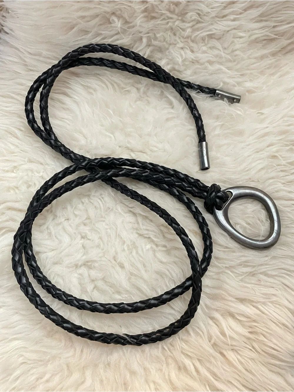 Braided blackโwrap around belt with a pewter ring buckle